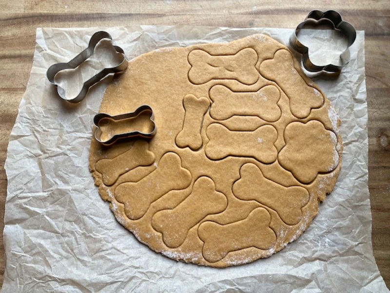 dough cut with dog bone cookie cutters for simple homemade dog treats
