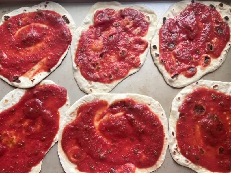 naan bread with pizza sauce