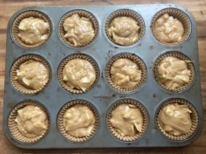apple crumb muffins ready to bake