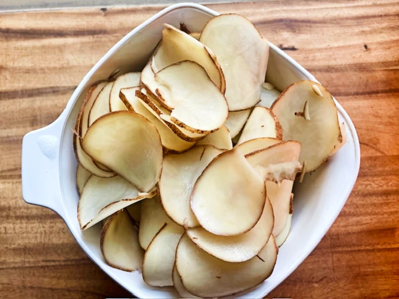 Thinly sliced potatoes for au gratin potatoes