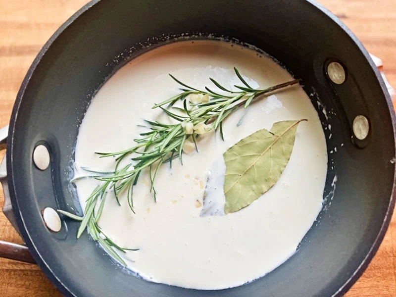 cream sauce ingredients simmering for au gratin potatoes