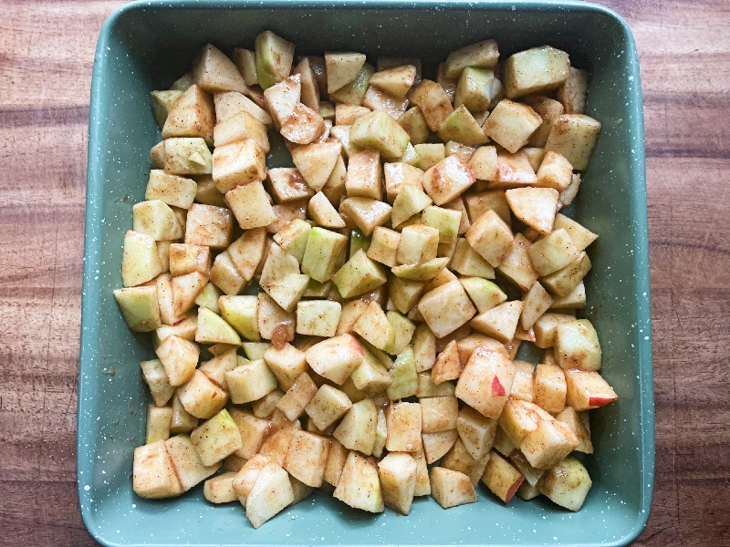apples seasoned in a baking dish