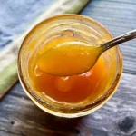 Spreadable peach butter made from ripe summer peaches, simple preserving recipe.