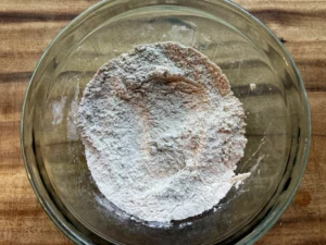 mini pumpkin muffins dry ingredients in a bowl