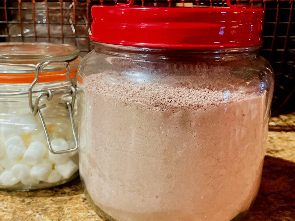 Jar of hot chocolate mix and marshmallows