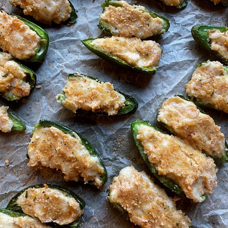 Baked jalapeno poppers on parchment