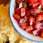 pico de Gallo in a bowl with tortilla chips
