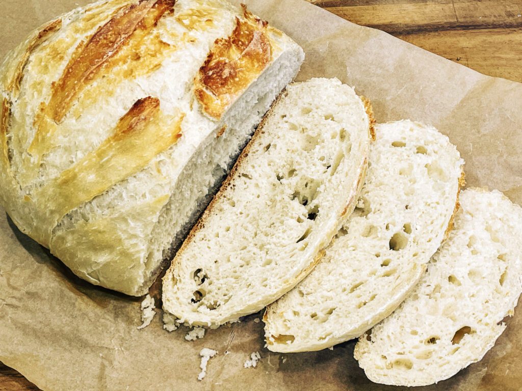 Freshly baked sliced artisan Dutch oven bread