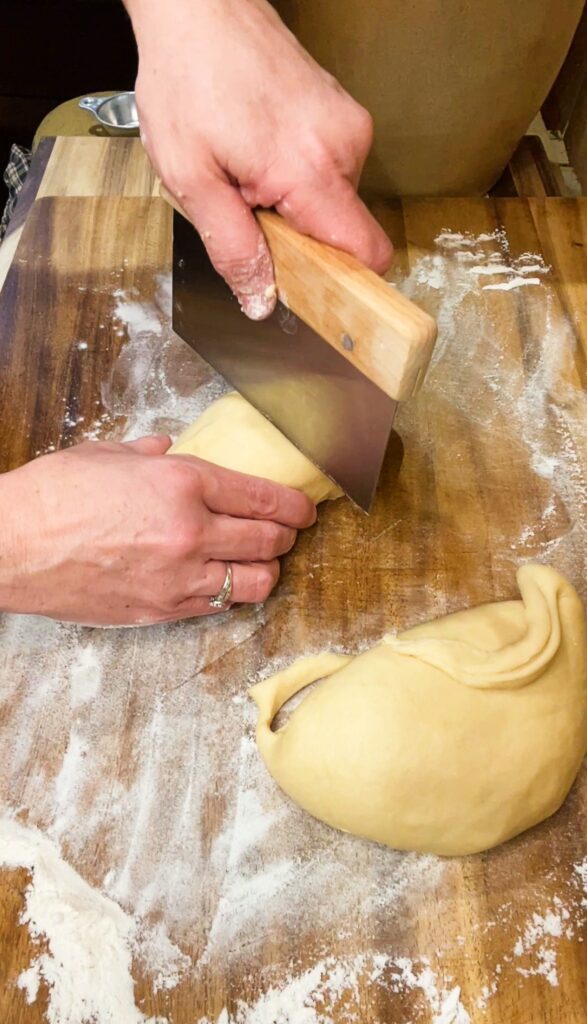 dividing dough for hamburger buns